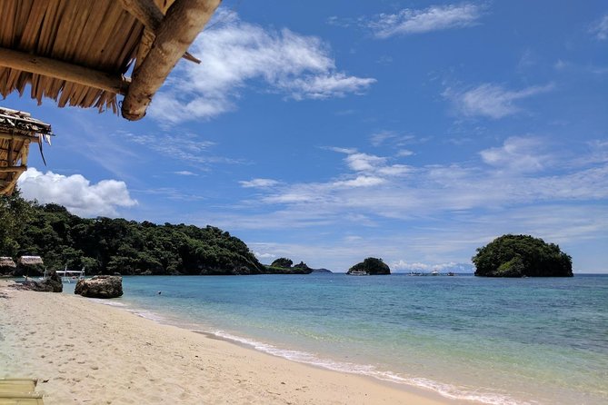 Boracay Island Hopping + Hot Kawa + Parasailing + Helmet Diving - White Beach parasailing: 15 minutes of sky-level views
