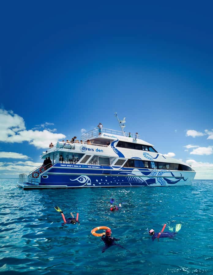 Cairns: Premium Snorkelling and Diving Reef Day Trip - AquaQuest comfort: deck space, indoor cooling, and hot showers