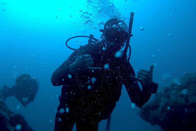 Discover Scuba diving in Gran Canaria with Hotel Pick-up - The Amadores Bay water time: what 40 minutes feels like