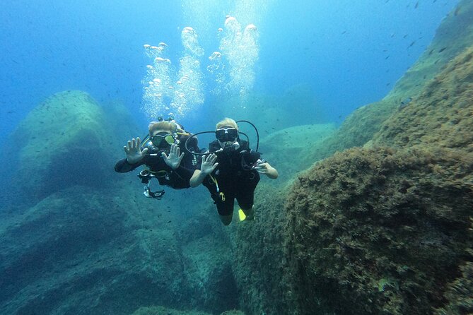 Discover Scuba diving in Villasimius - Where you start: Porto Turistico di Villasimius and a simple check-in flow