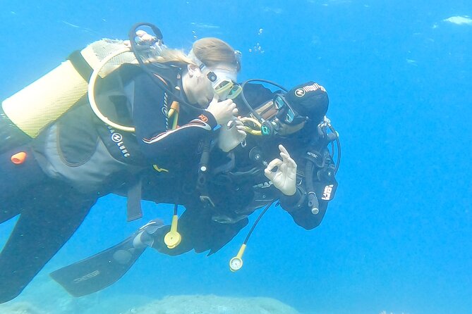 Diving baptism with cylinders (Introdive) at the Capo Carbonara Marine Protected Area - Pickup, Center Arrival, and Getting Ready Without Guesswork
