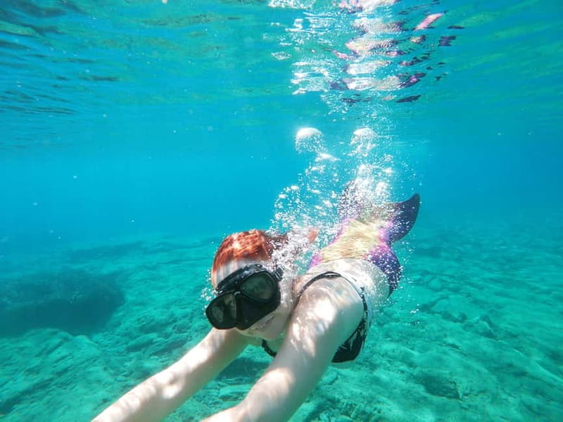 Heraklion: Boat Safari with guided snorkeling/diving tour. - The Boat Ride Views: Coastal Color and Rock Formations