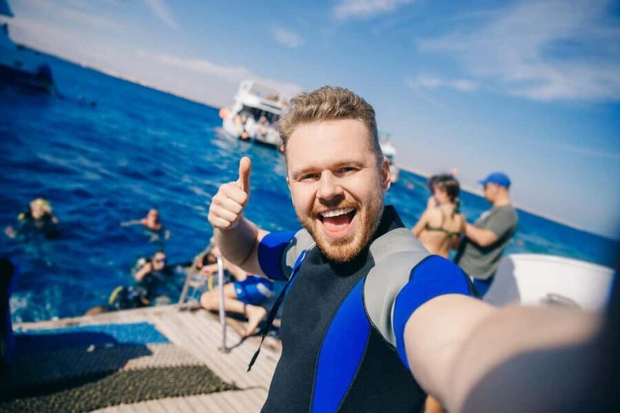 Hurghada: Scuba Diving for Beginners & Certified Divers - Getting to the boat: pickup, timing, and what “the day flows” means