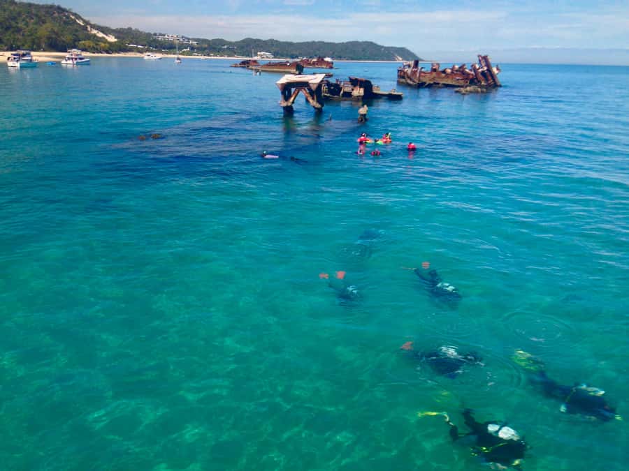 Moreton Island Day-Trip to Scuba Dive and More - After the water: the included island lineup (SUP, kayak hire, snorkel gear, sports)