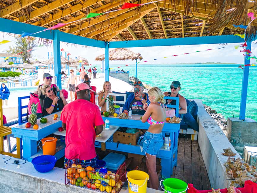Nassau: SNUBA Diving Island Cruise with Bahamian Lunch - Sun Cay beach day: lunch with sea views, 3 beaches, pools, bars