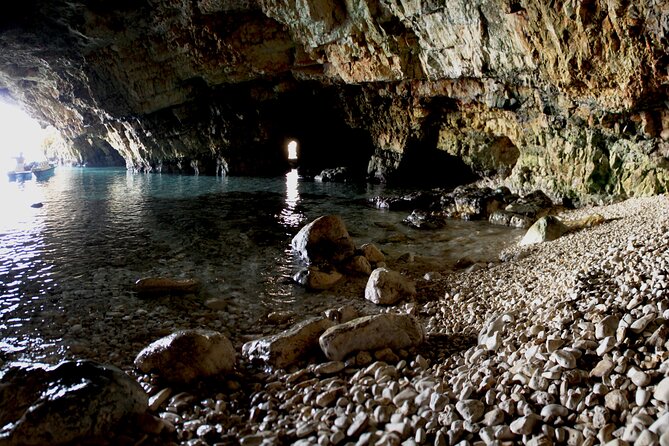 Polignano a Mare boat tour emotions, caves, diving and appetizers - Grotta Piana: Emerald-Green Water and Quiet Shoreline Feel
