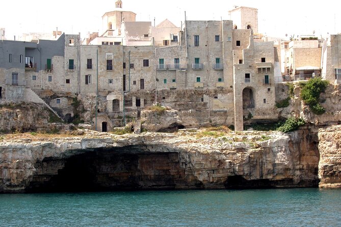 Polignano a Mare boat tour emotions, caves, diving and appetizers - Lama Monachile Aperitivo: Taralli and Prosecco, Served Simply