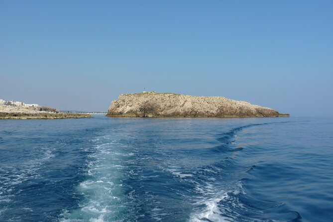 Polignano a Mare boat tour emotions, caves, diving and appetizers - Where You Meet and Why the Small Group Matters