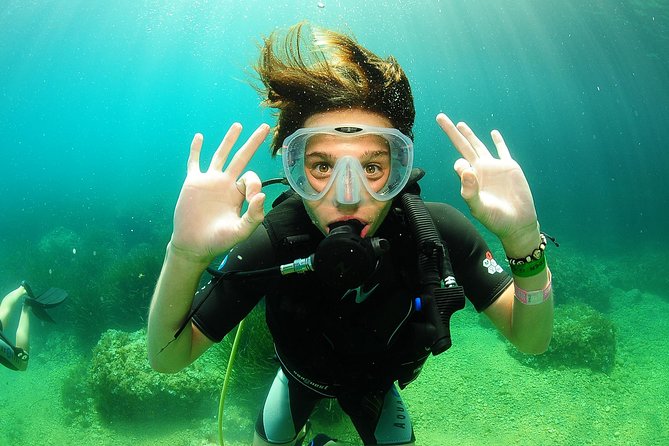 Scuba Diving Baptism and Snorkeling in Ibiza - Boat time between groups: deck sun, swimming, and snorkeling