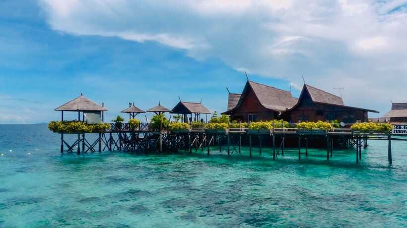 Semporna: Mabul and Kapalai Trip in Snorkel or Dive & Lunch - Rain, sea conditions, and how flexible you should stay