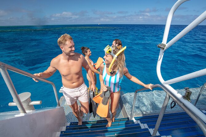Silverswift Dive and Snorkel Great Barrier Reef Cruise - The catamaran setup: showers, sun decks, restrooms, and the food that keeps you going